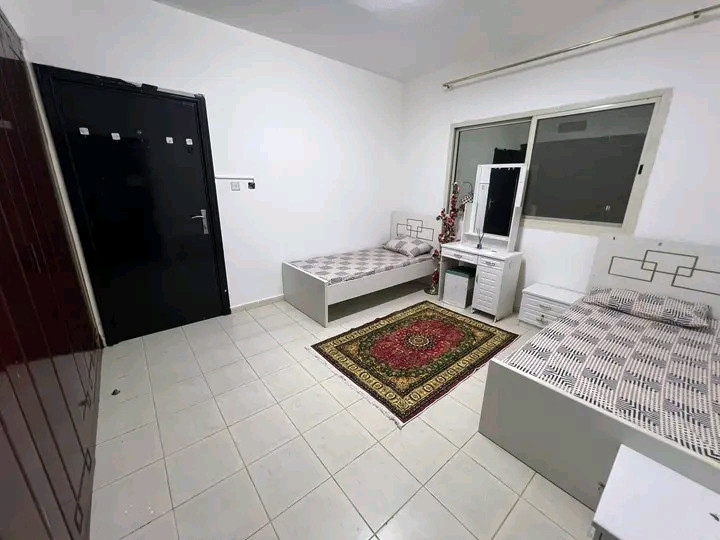 First tenant opens a room in a clean and organized girls' apartment