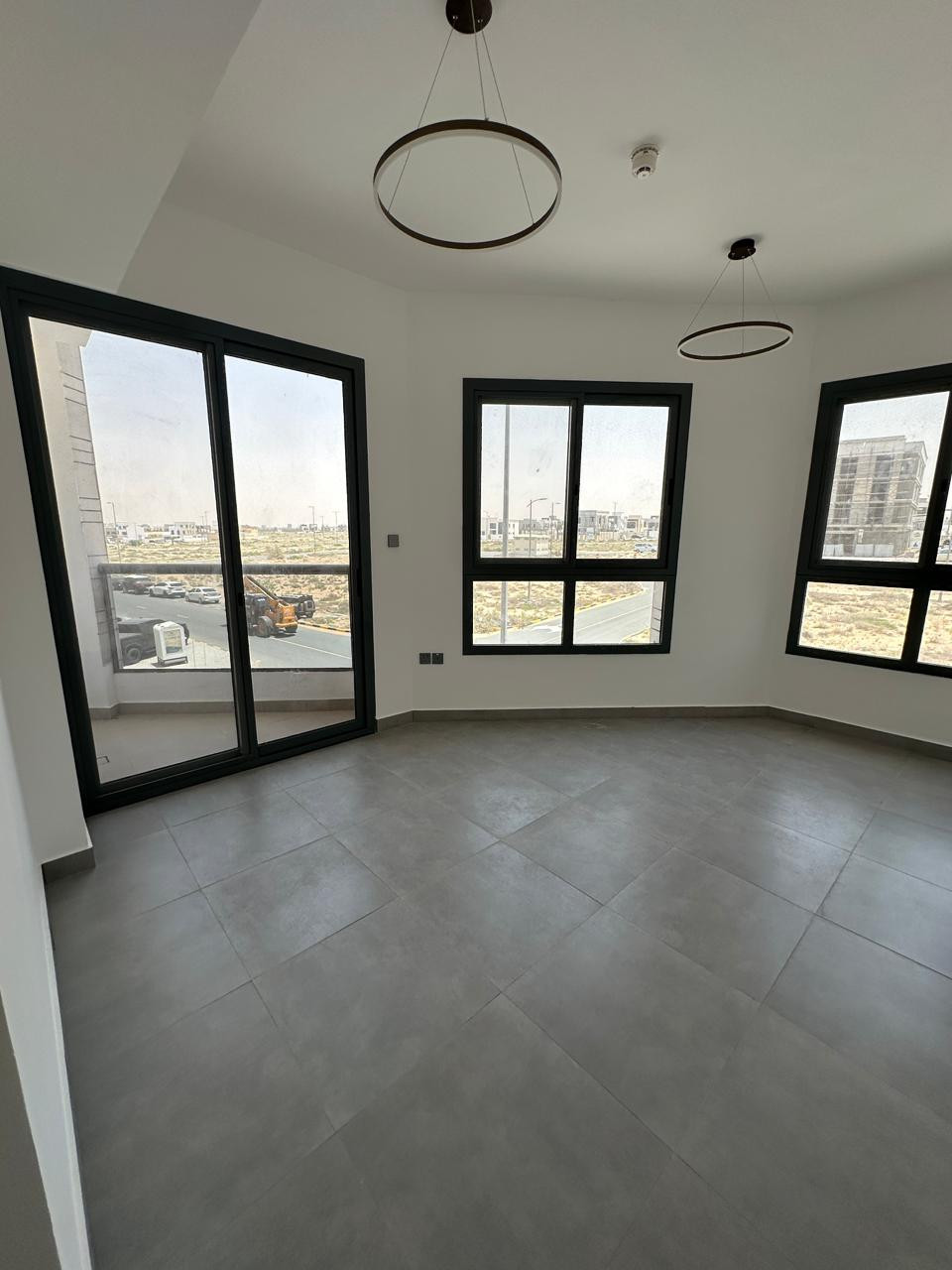 The most beautiful two-bedroom apartment in the Telal City area, first occupancy, with two balconies.
