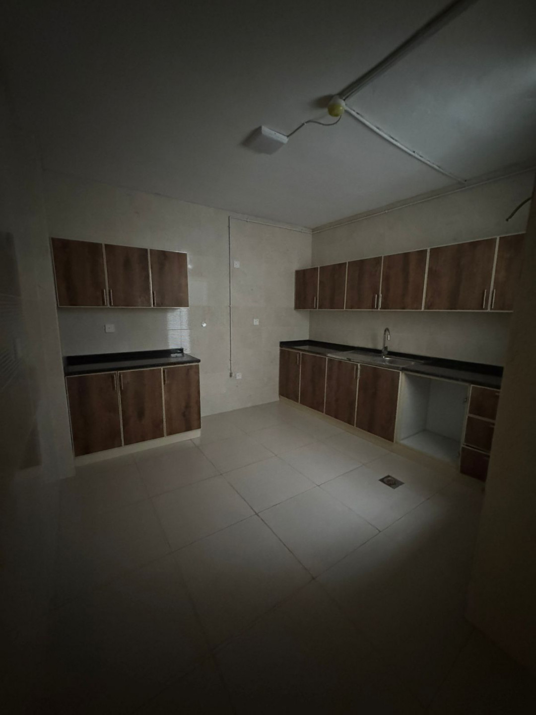 The largest and most stylish three-bedroom apartment in Al Majaz 2, overlooking Al Wahda Street.