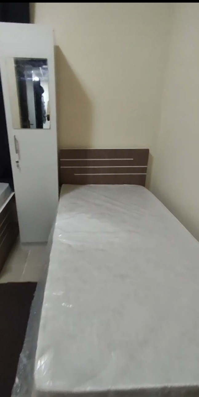First tenant, five-bedroom apartment with a spacious living room, suitable for young men.