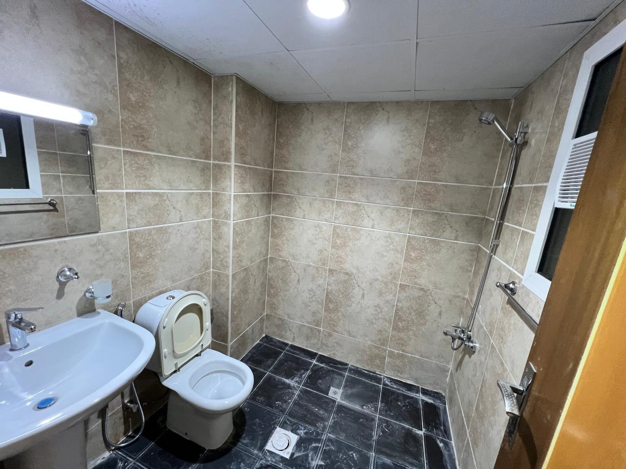First tenant, one bedroom and living room with balcony