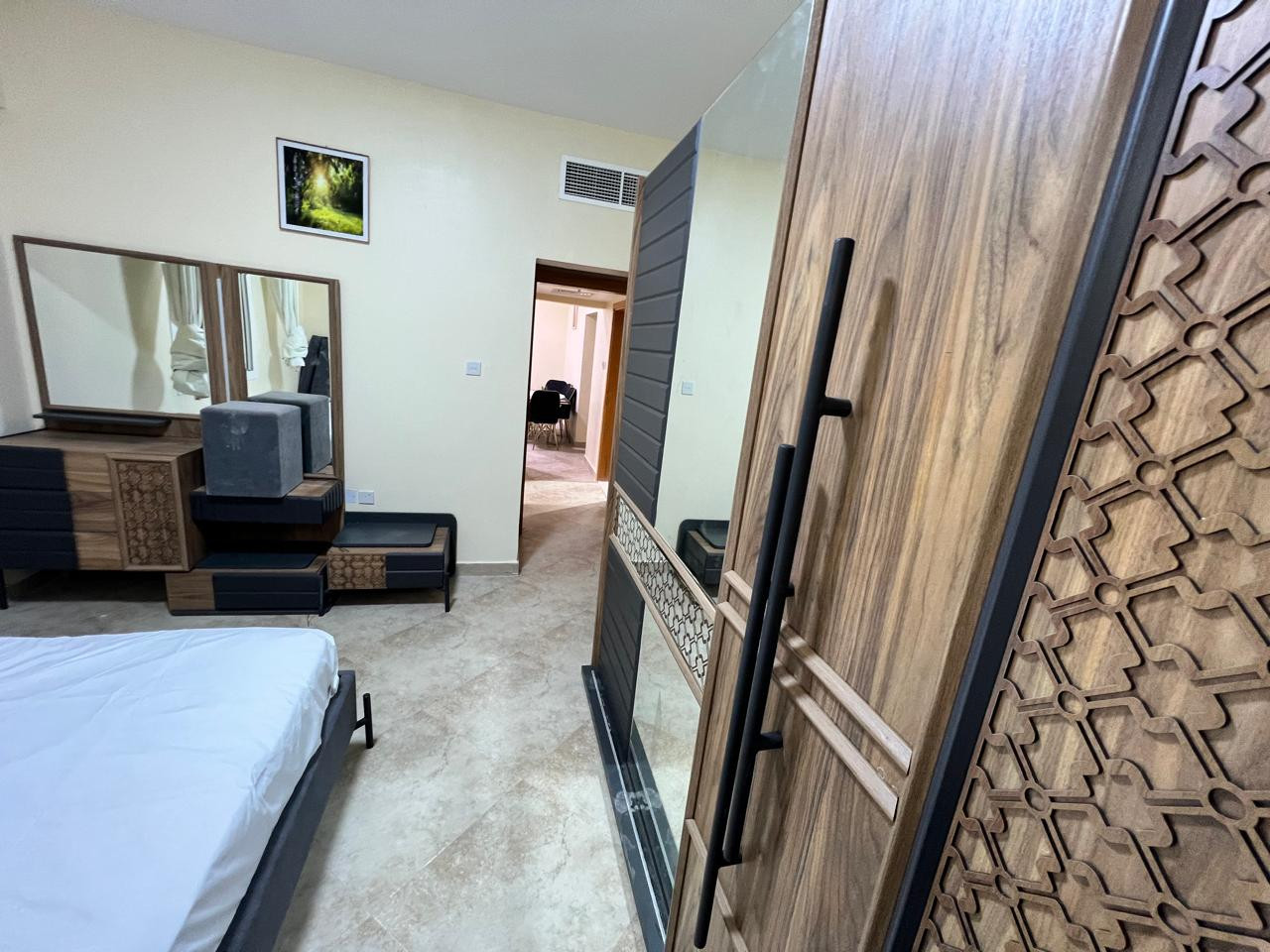 First tenant, one bedroom and living room with balcony