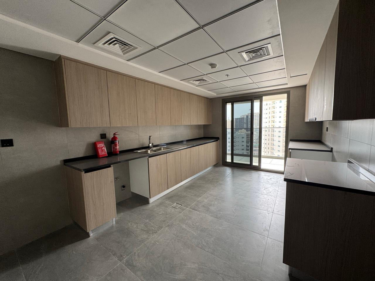 Luxury 3-bedroom apartment with master bedroom and living room | Sharjah | Gym | 2 parking spaces | Swimming pool | Built-in wardrobes | Open terrace