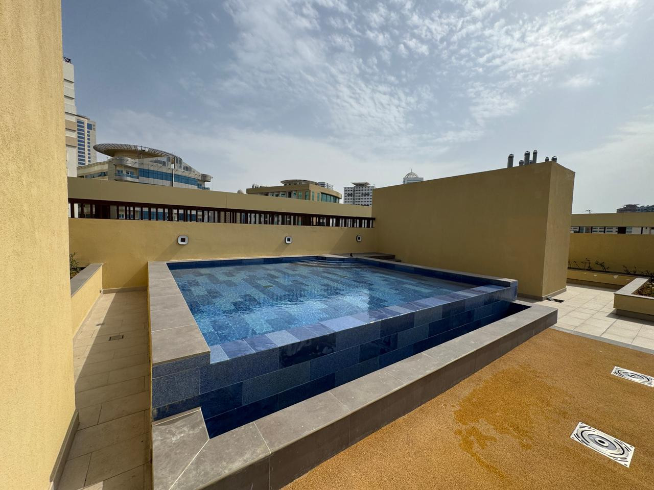 Luxury 3-bedroom apartment with master bedroom and living room | Sharjah | Gym | 2 parking spaces | Swimming pool | Built-in wardrobes | Open terrace