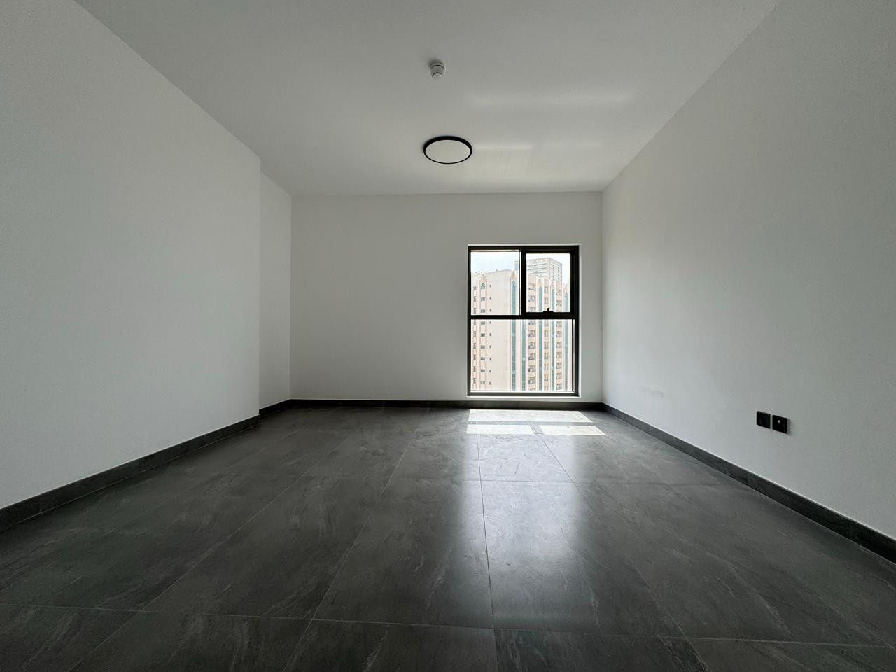 Luxury 3-bedroom apartment with master bedroom and living room | Sharjah | Gym | 2 parking spaces | Swimming pool | Built-in wardrobes | Open terrace