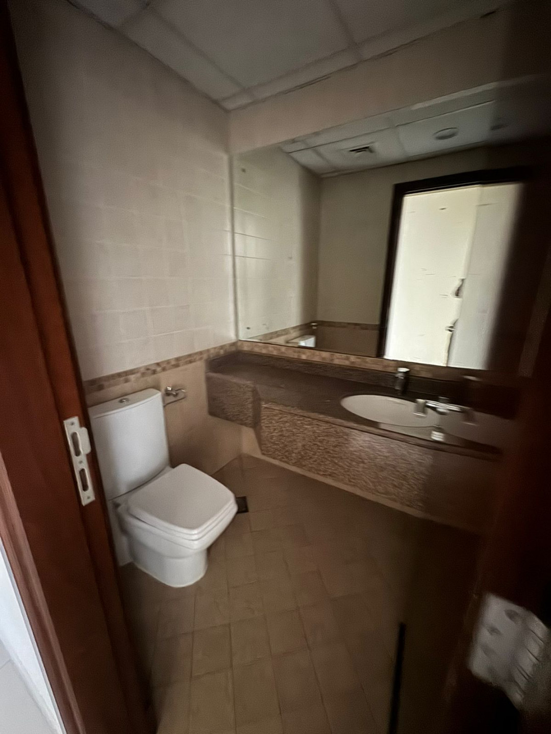 The finest three-bedroom apartment with a living room in the Al Khan area of Sharjah, with a sea view.