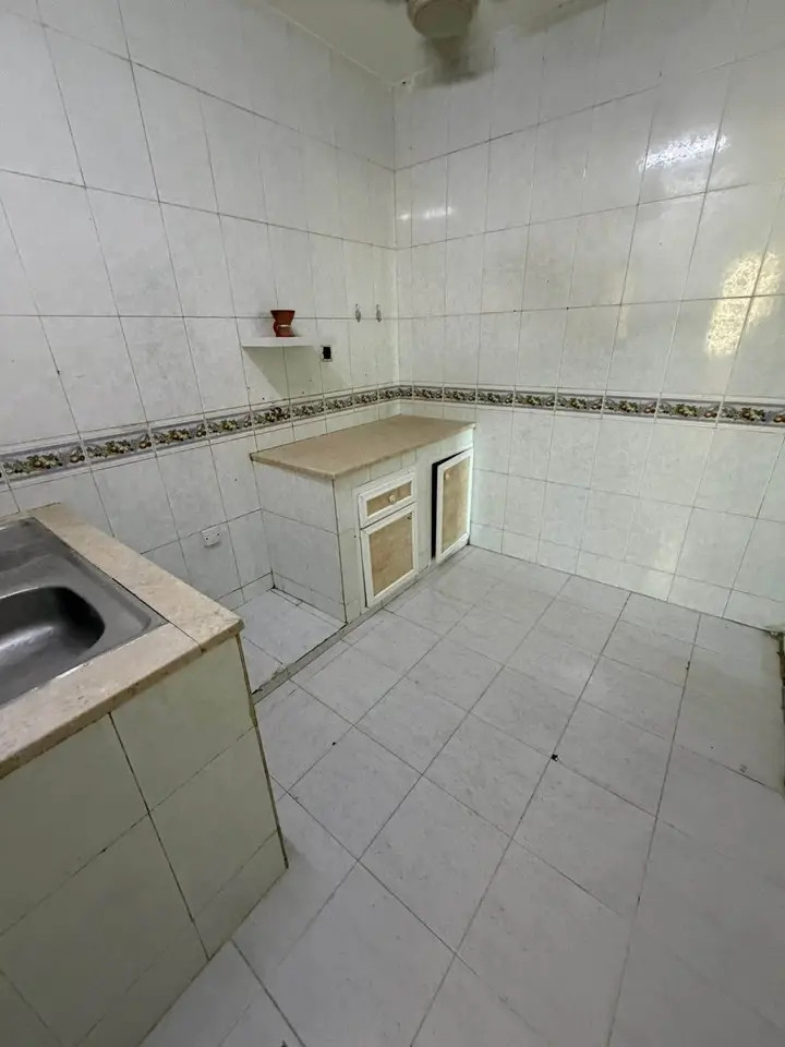 Studio apartment with one room and bathroom, plus two balconies.