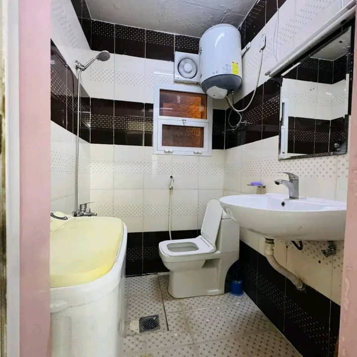 Studio apartment with a bedroom and bathroom, furnished with new furniture.