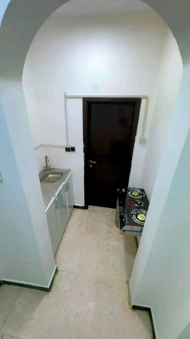 Studio apartment with room and kitchen in Al Ghubra North
