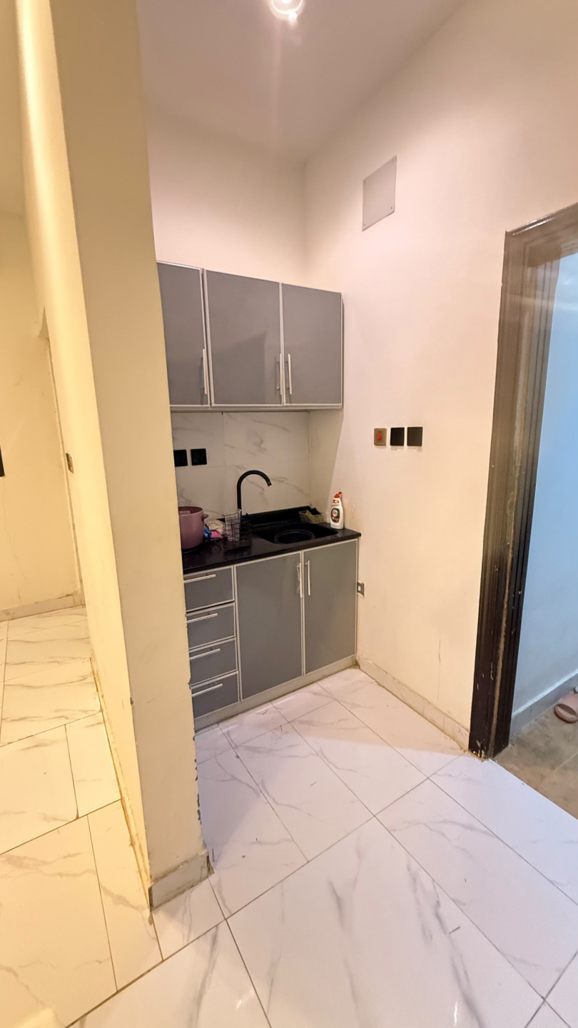 Studio apartment in Al Rawdah neighborhood, one room, bathroom, and kitchen.