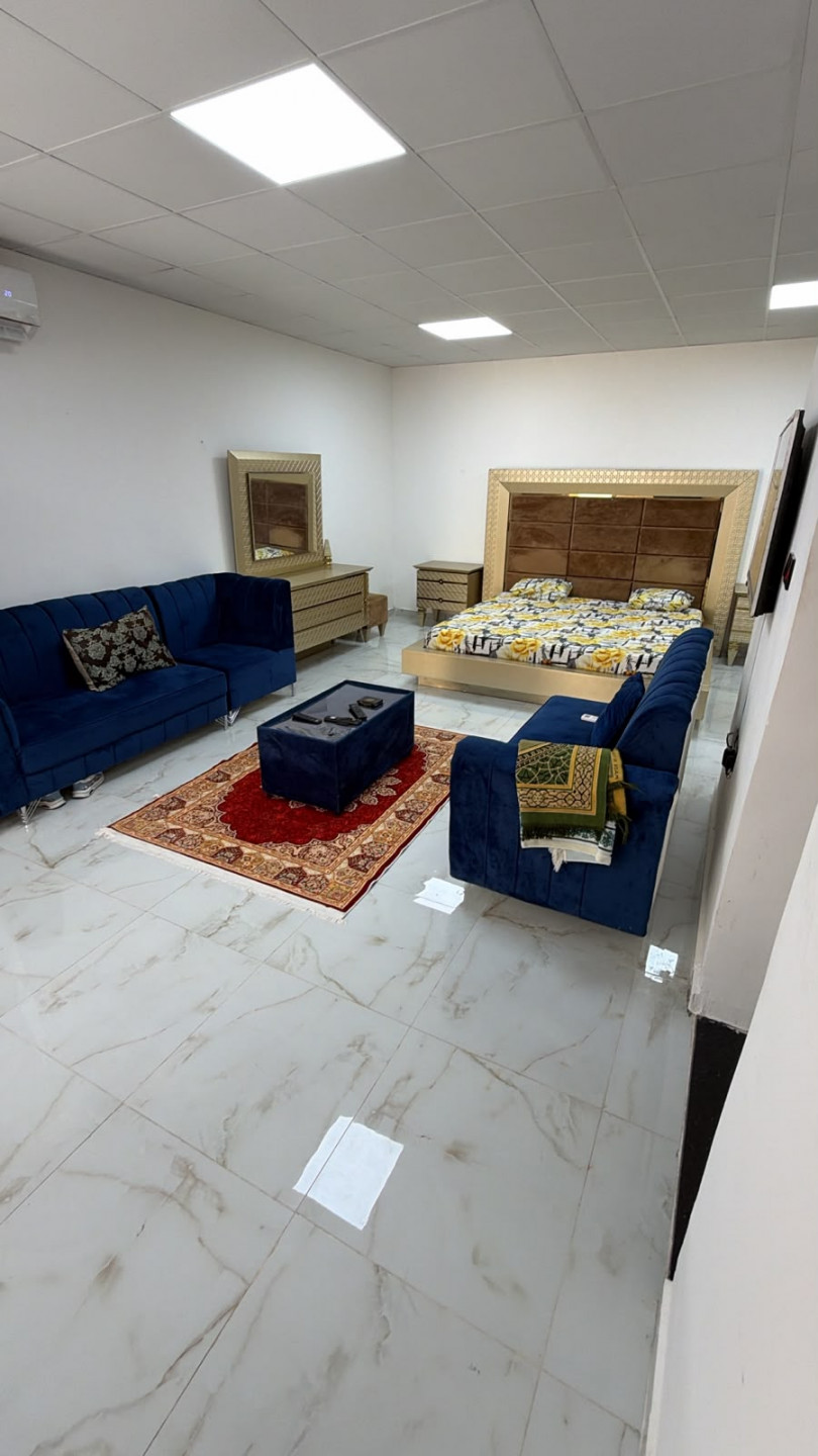 Furnished studio apartment with hotel-style furniture, first occupancy