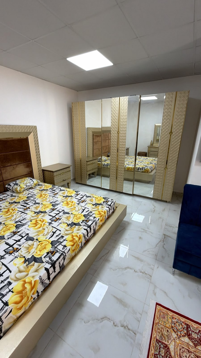 Furnished studio apartment with hotel-style furniture, first occupancy
