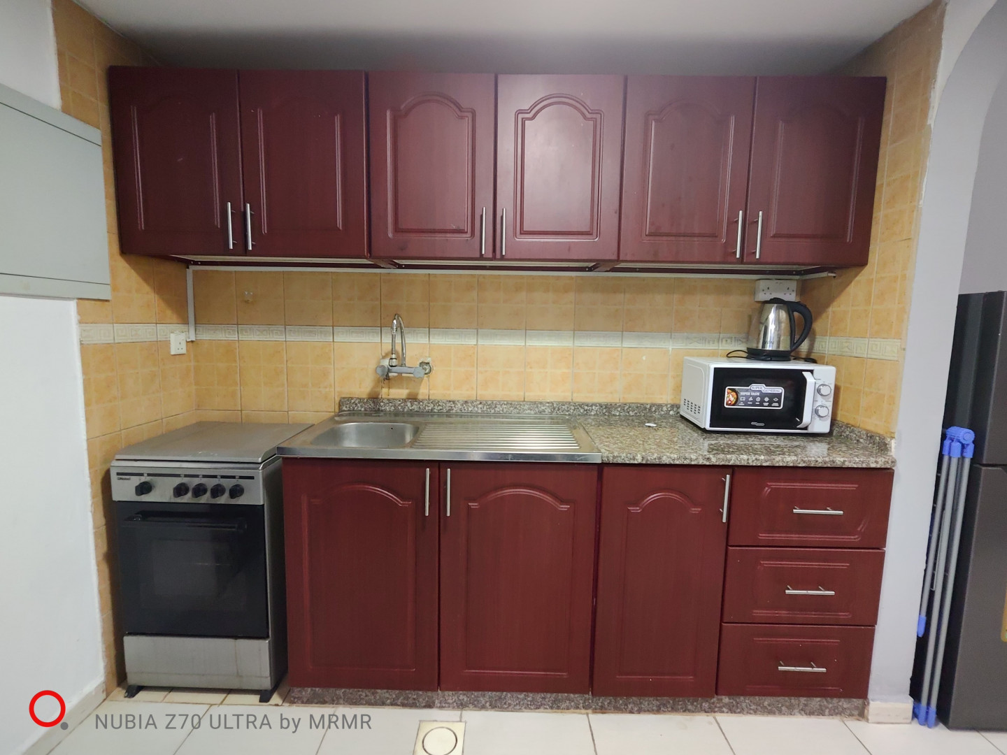 Furnished studio with hotel-style furniture and an open view.