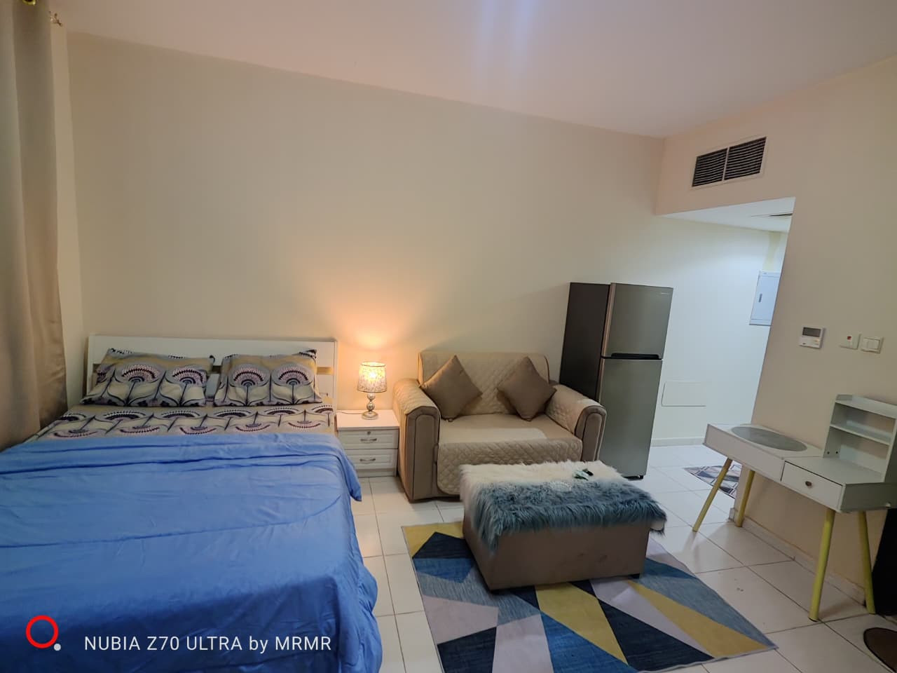 Furnished studio with hotel-style furniture