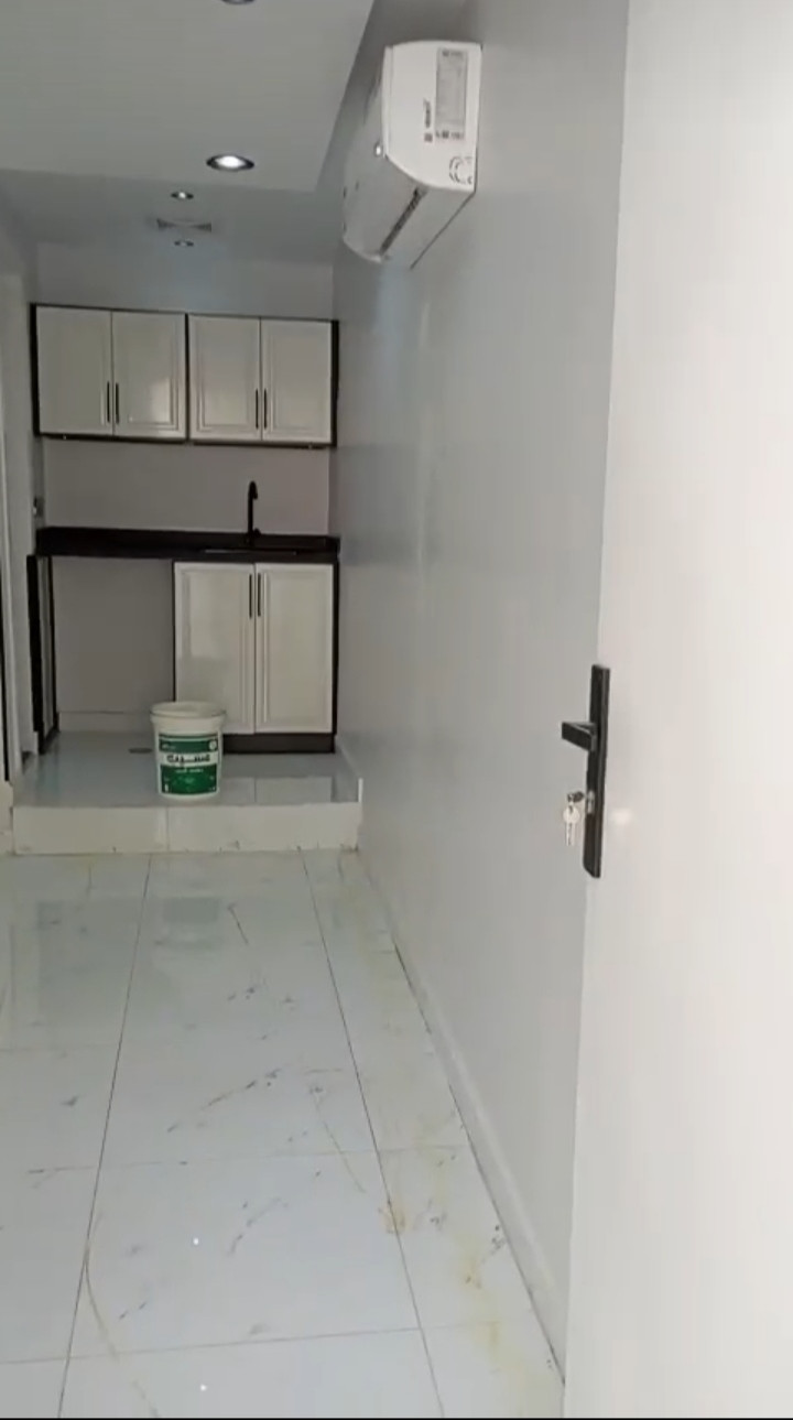 Spacious studio apartment with room, bathroom, and kitchen