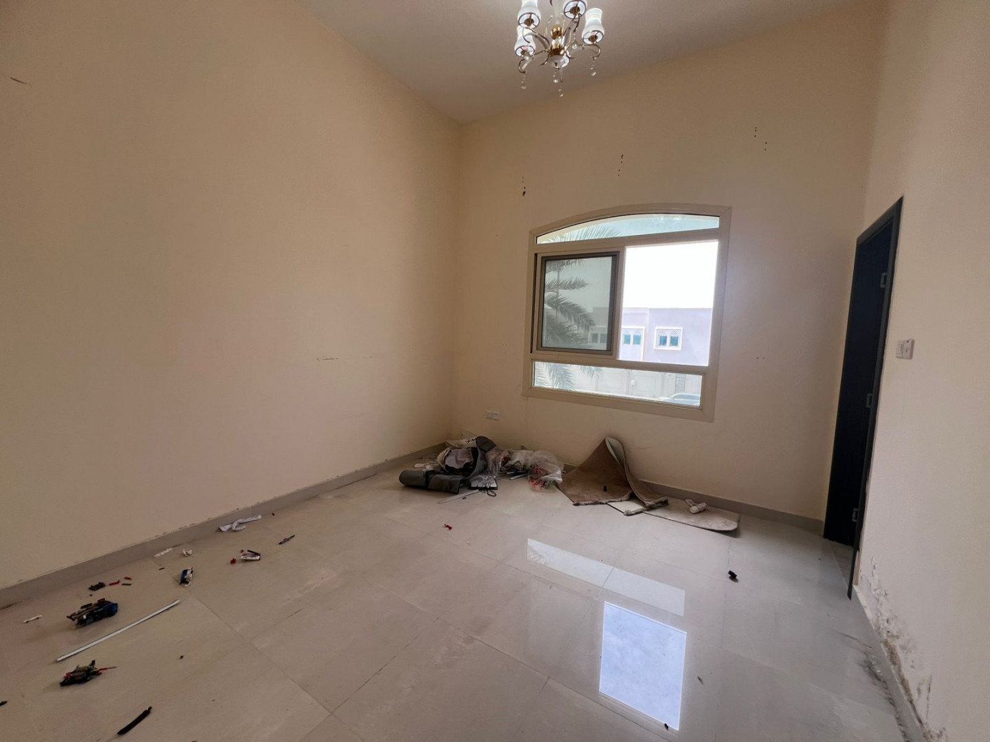 Two-story villa for rent in Al Ghafia, prime location on a main street, 5 master bedrooms and a laundry room