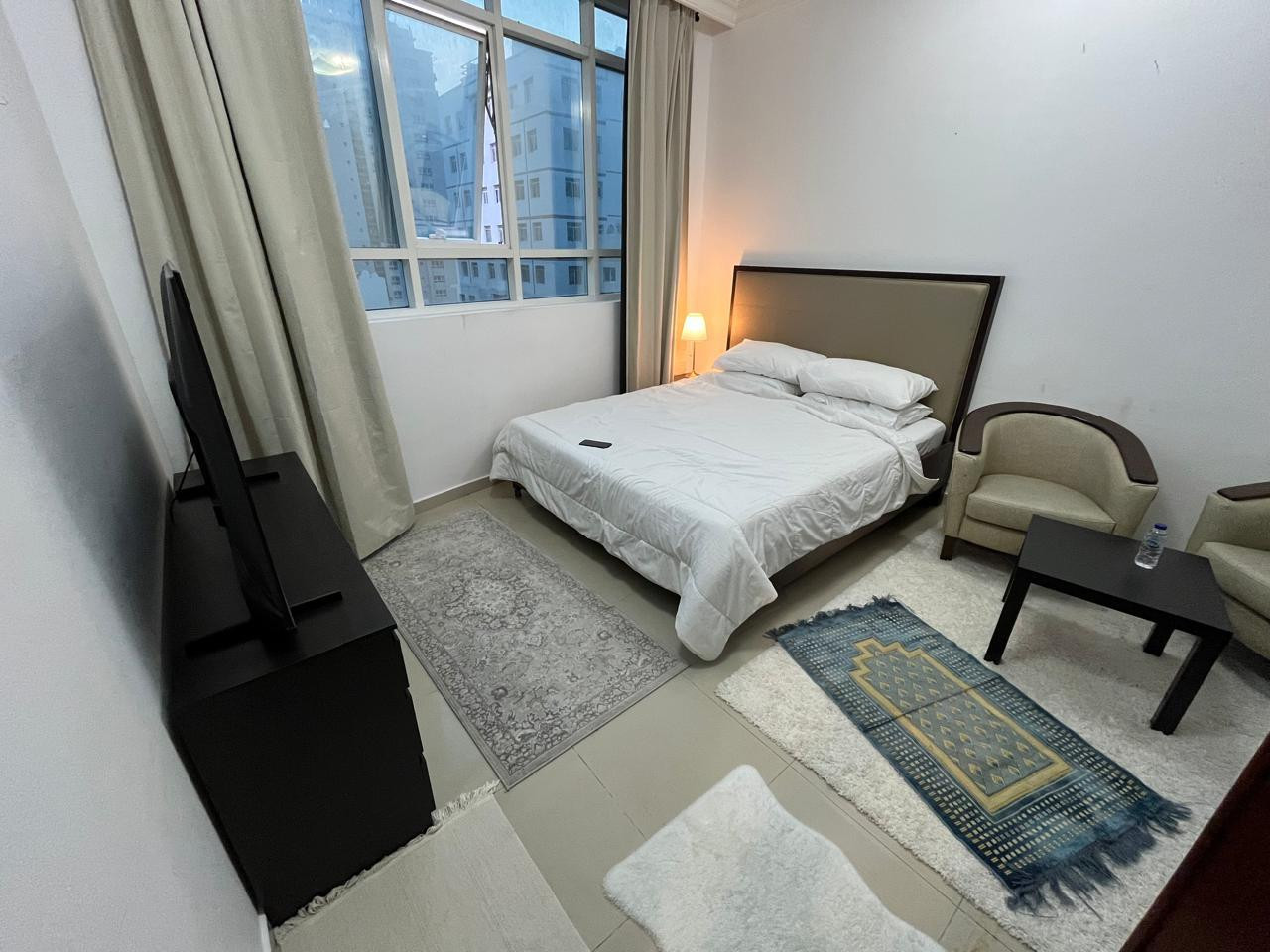 Very clean family room with shared bathroom