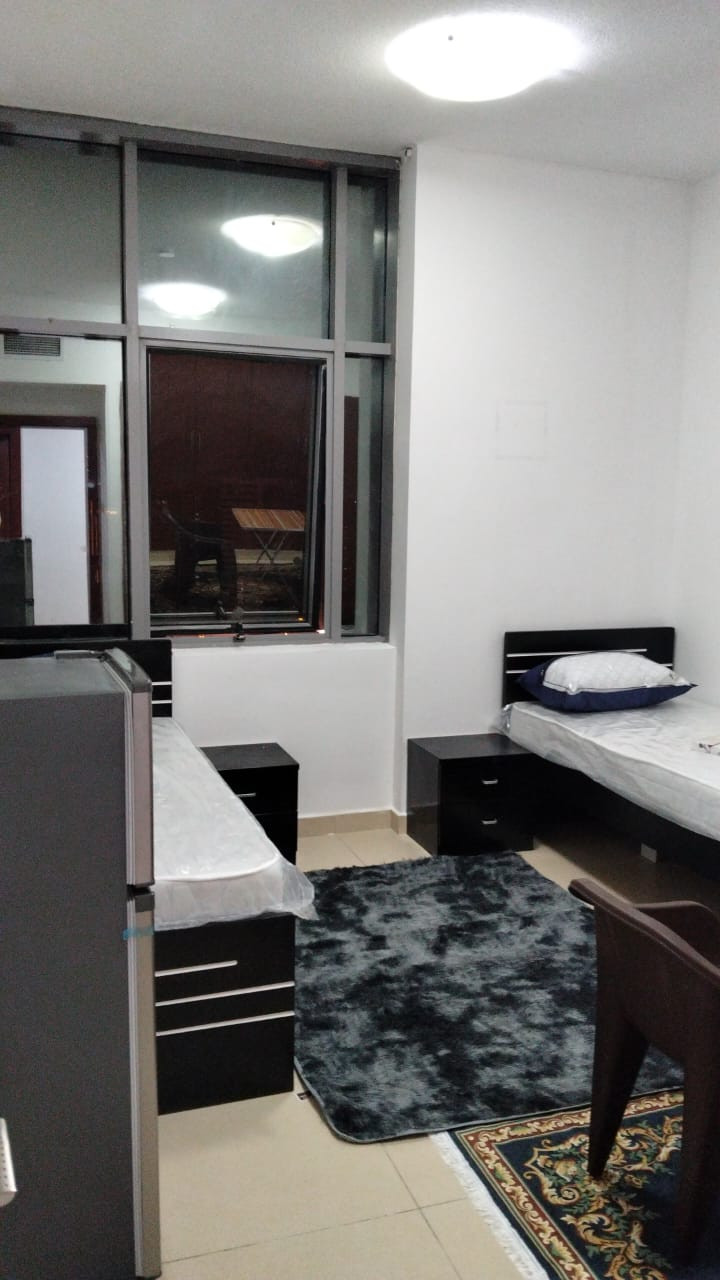 A room for two young men with a balcony