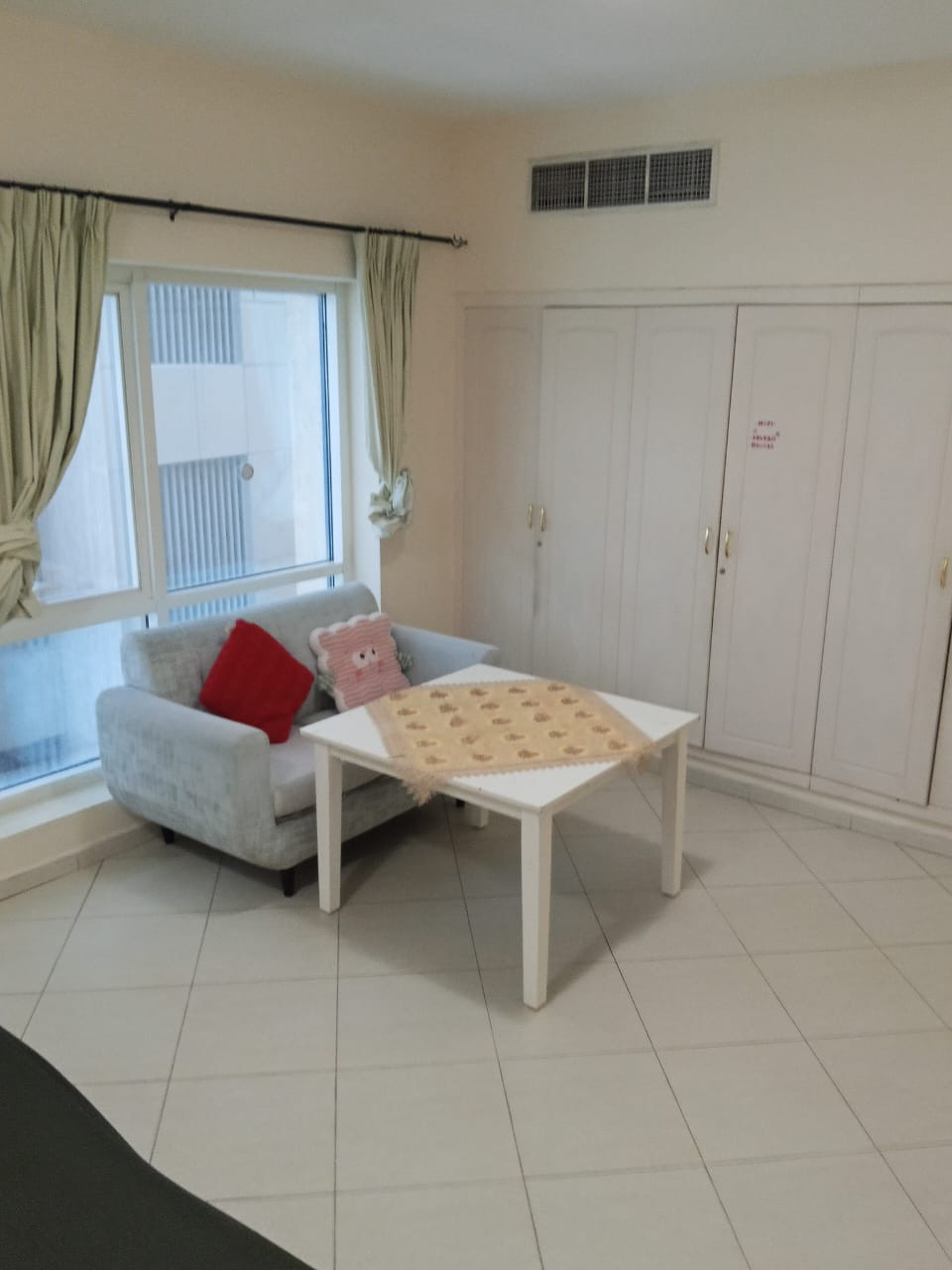 Spacious room with shared bathroom