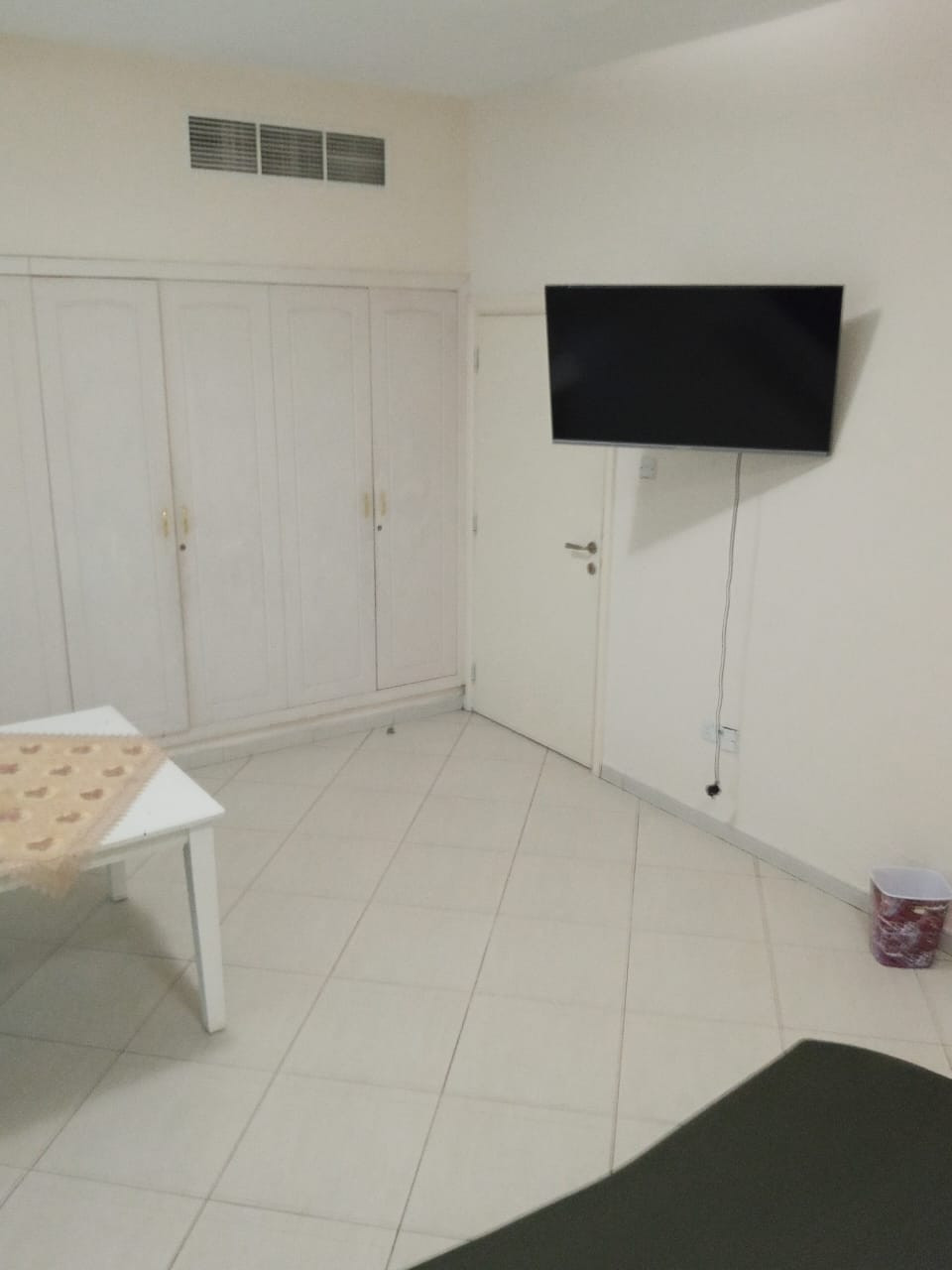 Spacious room with shared bathroom