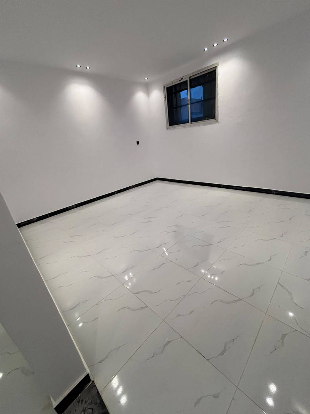 A shared room with a prime location
