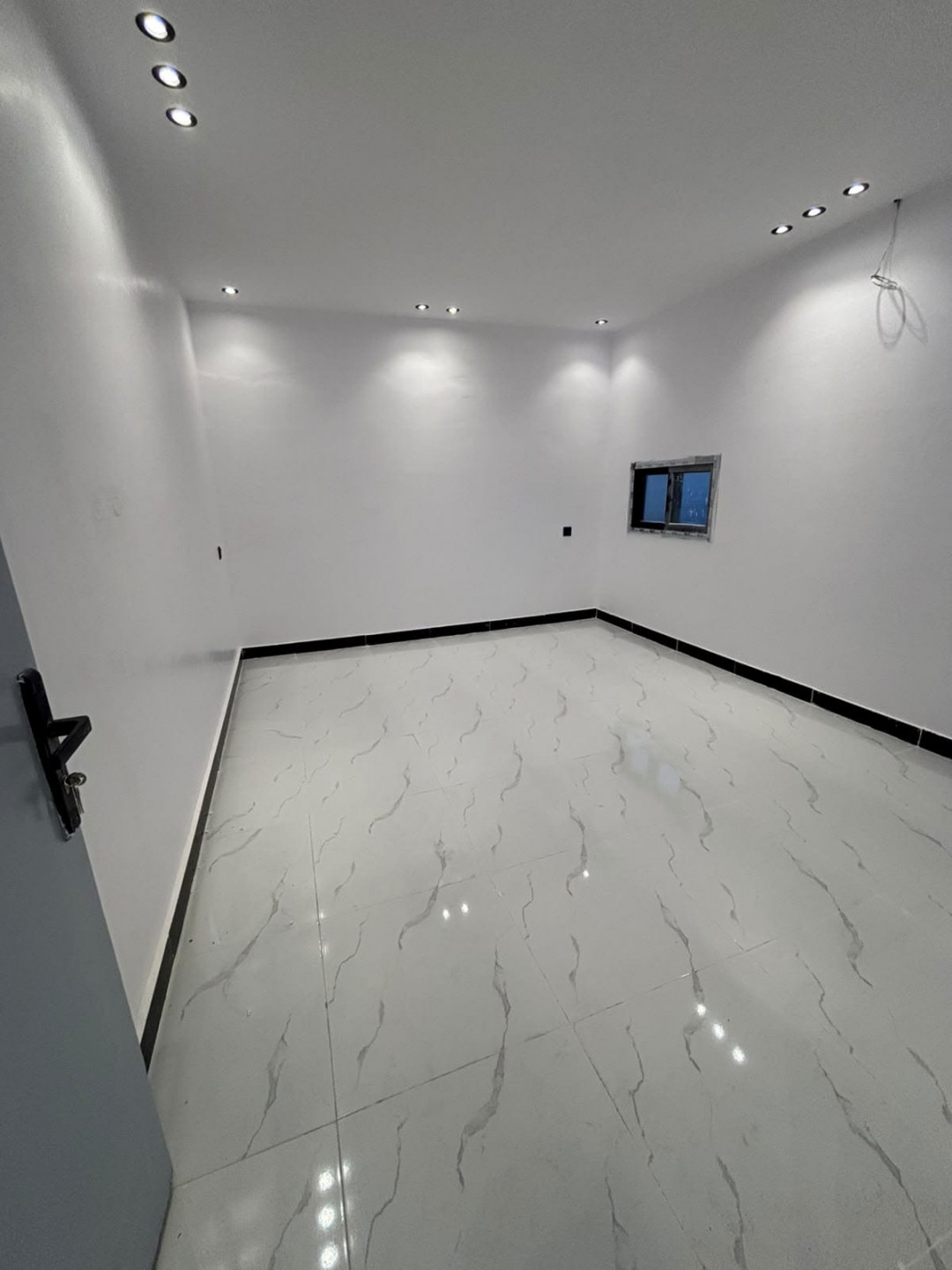 A shared room with a prime location