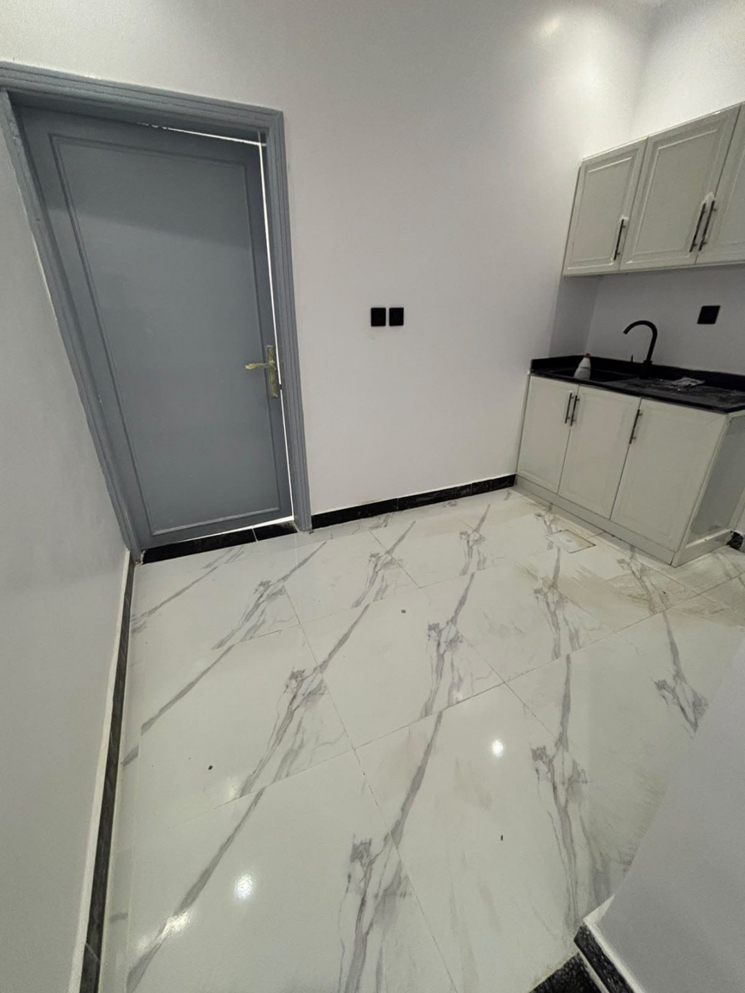 A shared room with a prime location