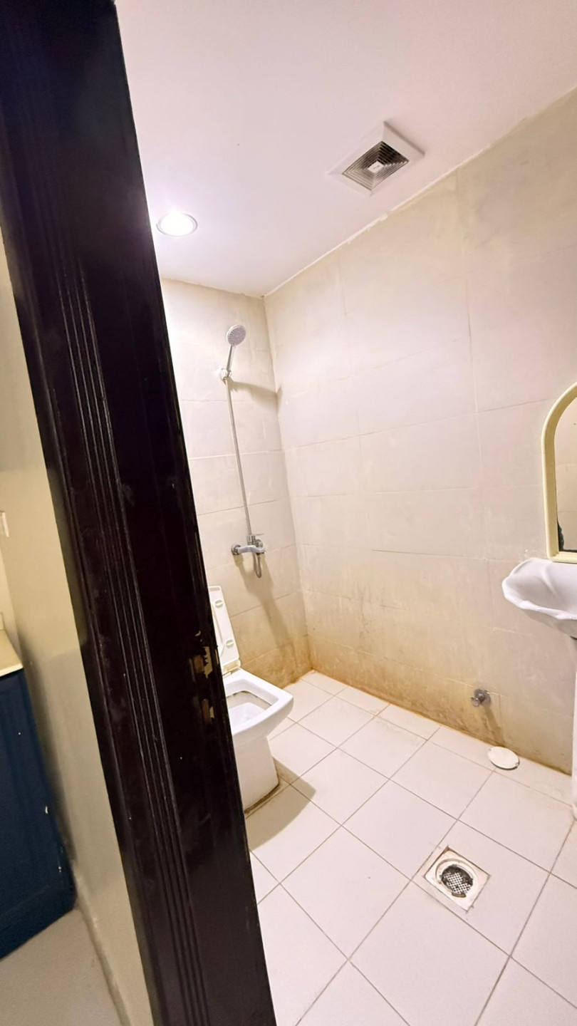 Room, bathroom, and kitchen in King Faisal neighborhood
