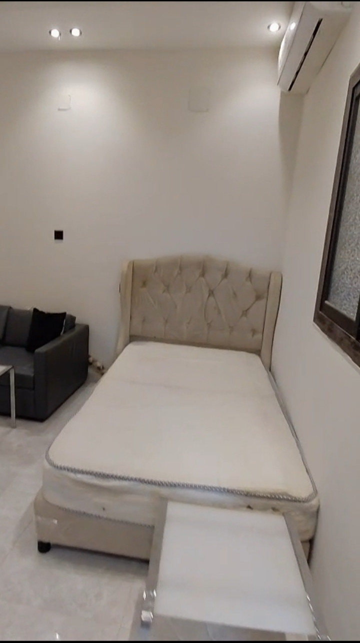 A separate room, bathroom, and kitchen with new air conditioning.