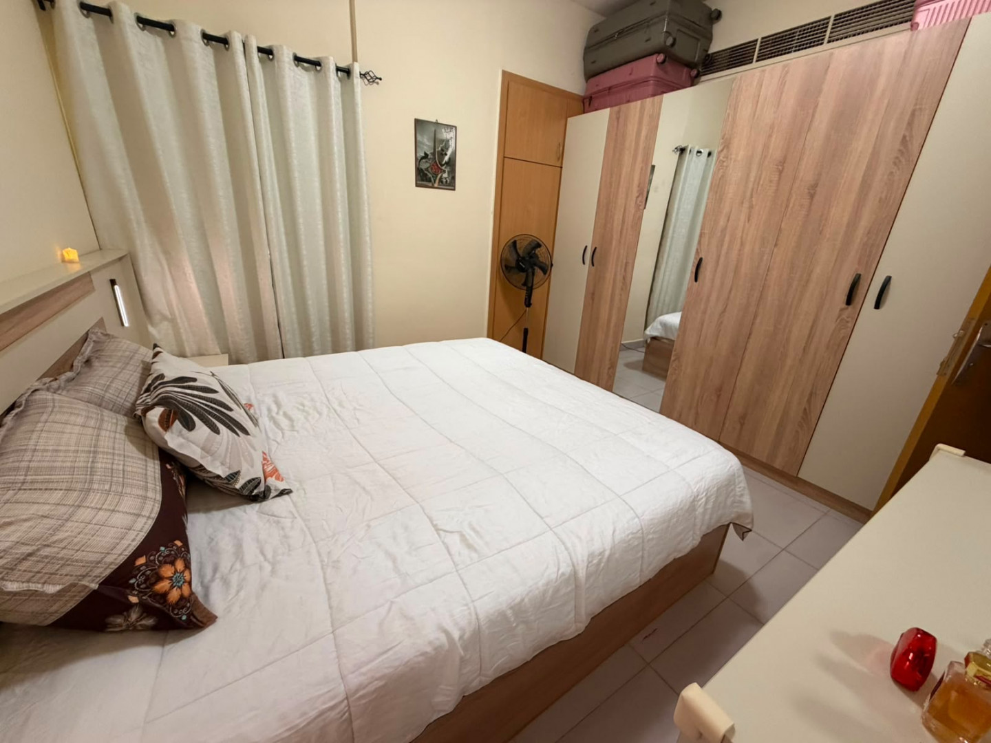 One bedroom and living room in a family tower, very clean furnishings