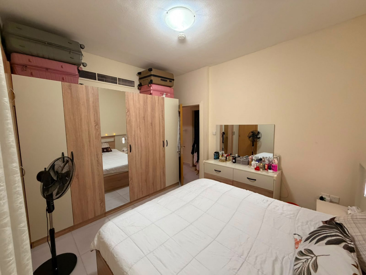 One bedroom and living room in a family tower, very clean furnishings