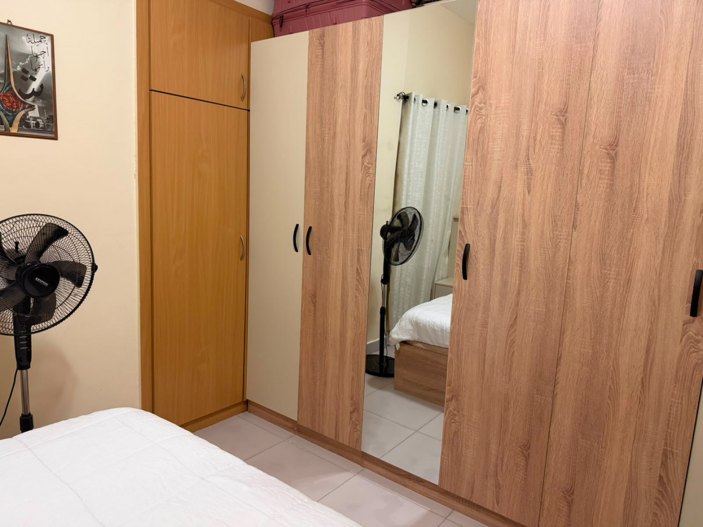 One bedroom and living room in a family tower, very clean furnishings