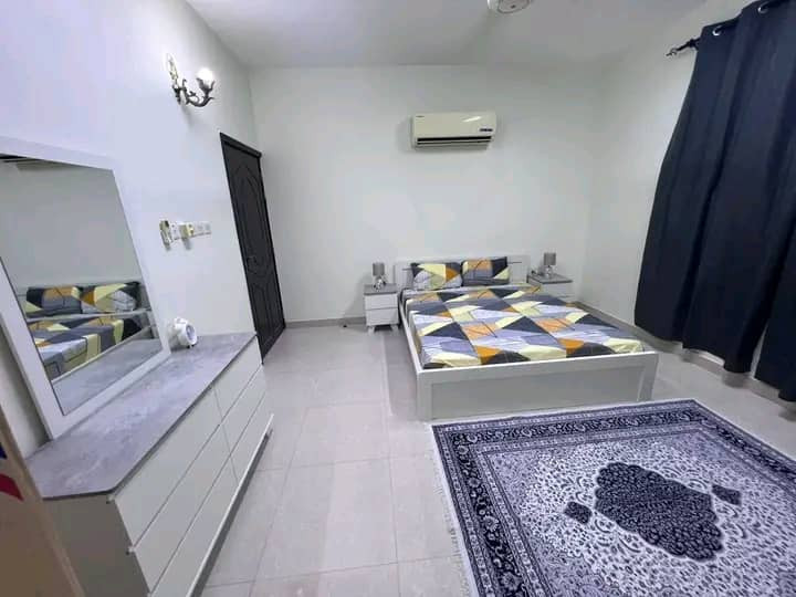 One bedroom and living room with new furnishings, first occupancy