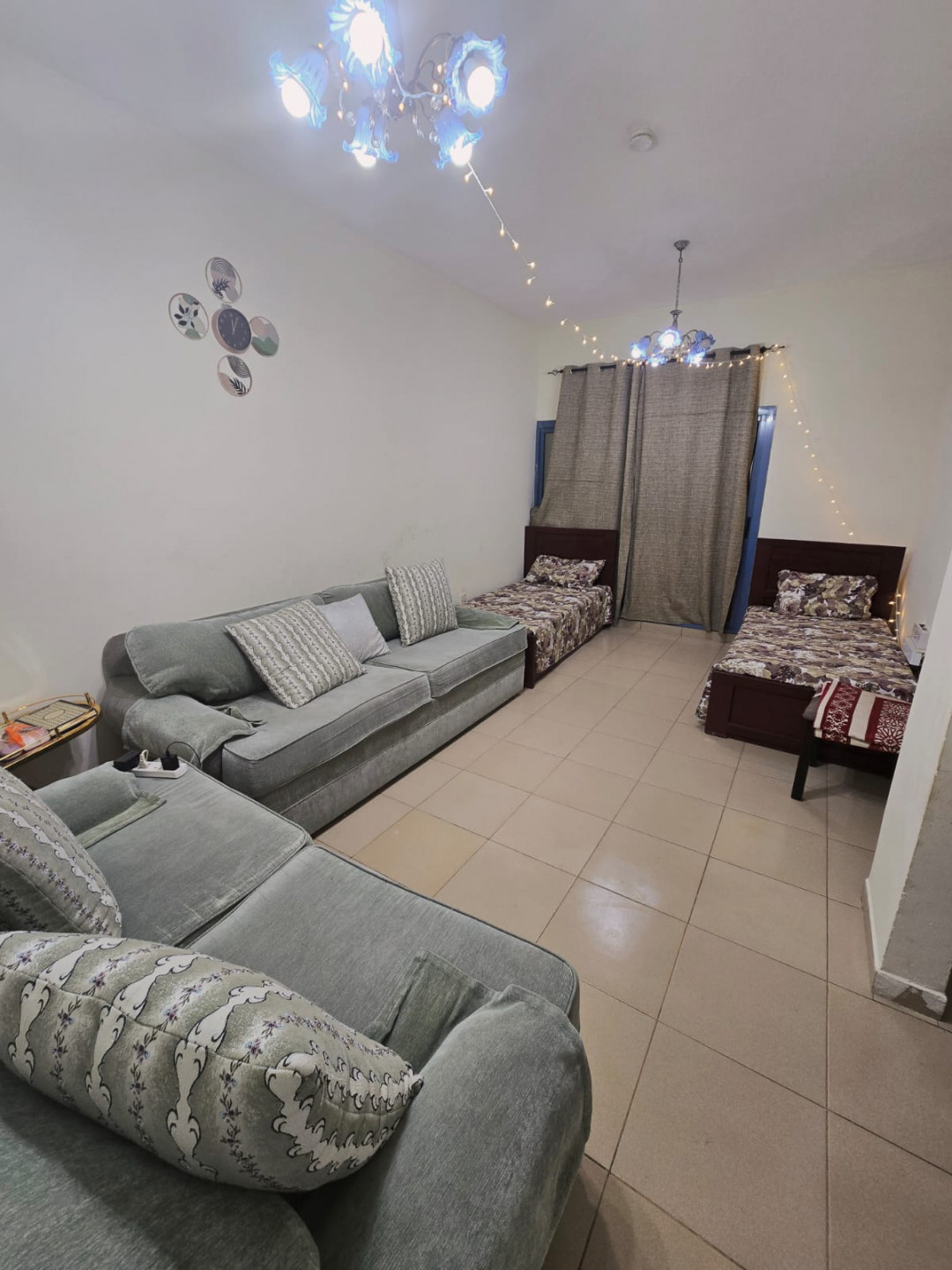 One bedroom and living room, clean furnishings, suitable for a family or single woman.
