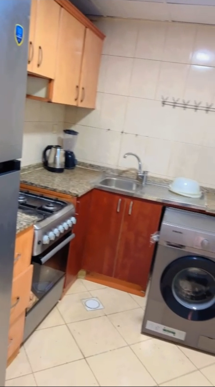 One bedroom and living room, clean furnishings, with an open view.