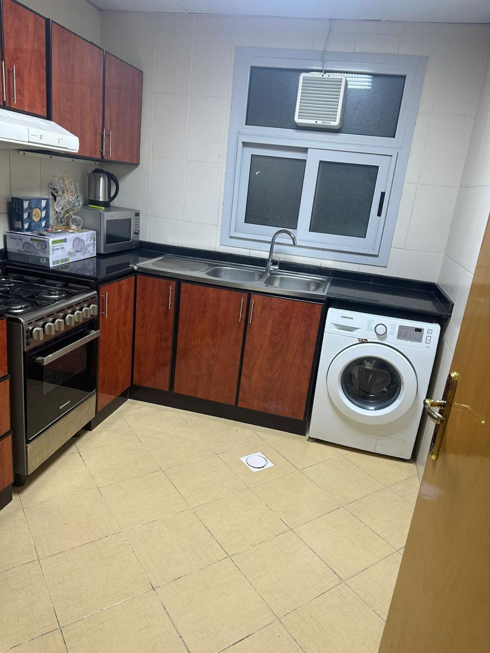 One bedroom and living room, clean furnishings, with a balcony.