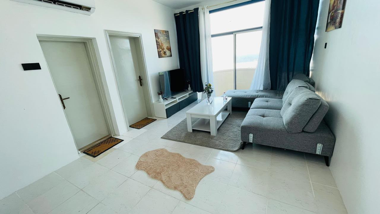 Furnished room and lounge with hotel-style furniture