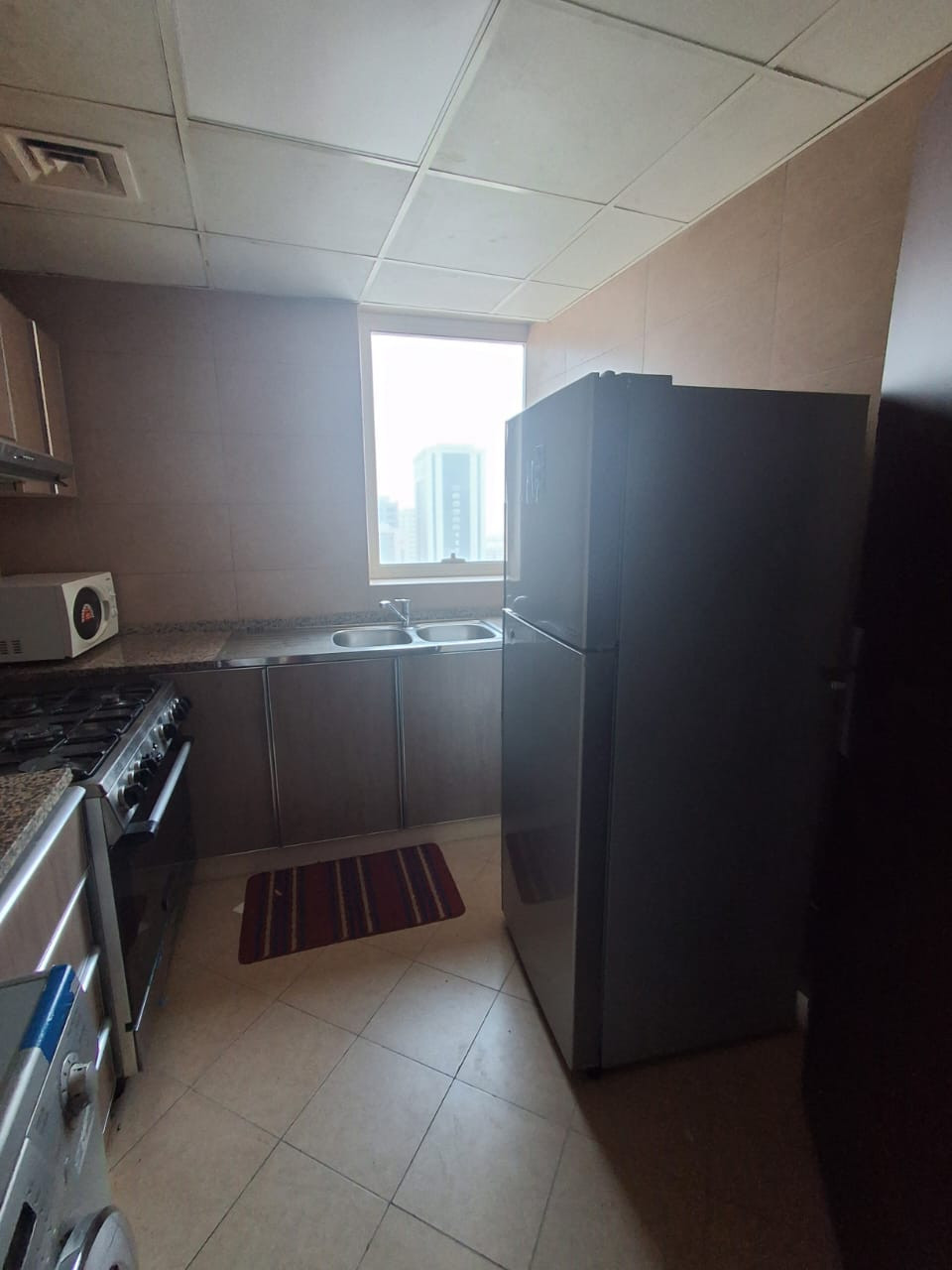 Furnished one bedroom and living room with two bathrooms and a gym
