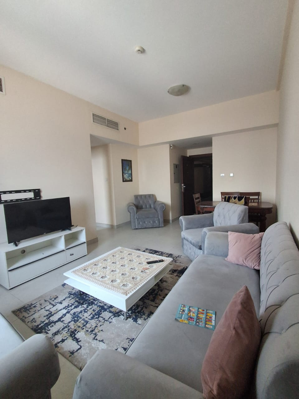 Furnished one bedroom and living room with two bathrooms and a gym