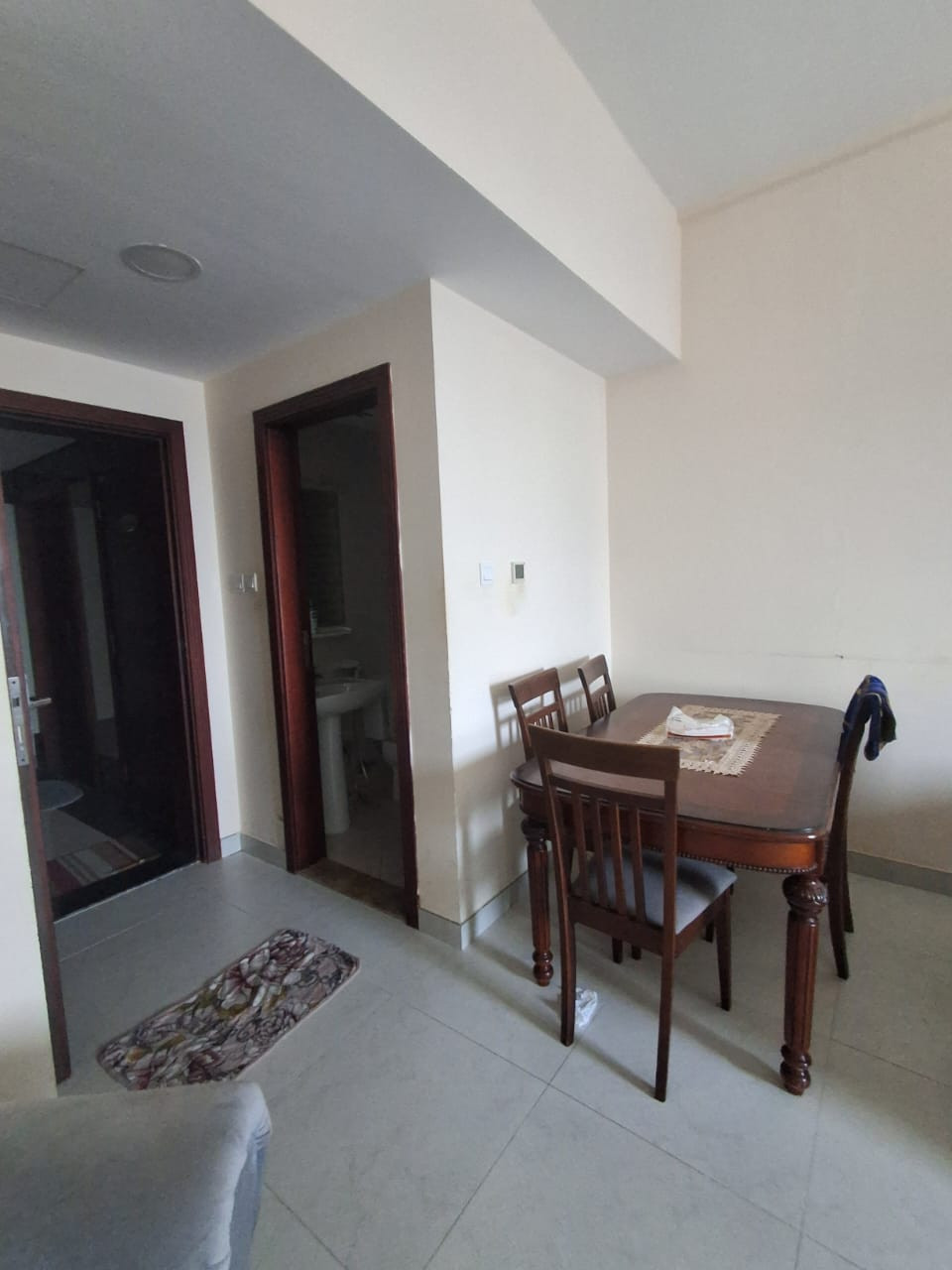 Furnished one bedroom and living room with two bathrooms and a gym