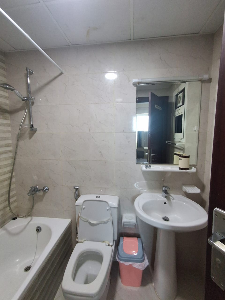 Furnished one bedroom and living room with two bathrooms and a gym