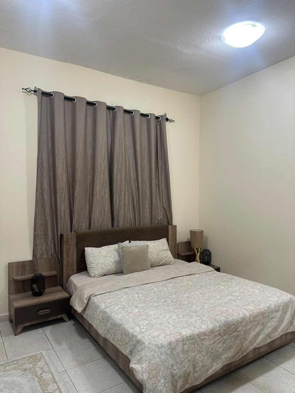 One bedroom and living room furnished with very clean furniture