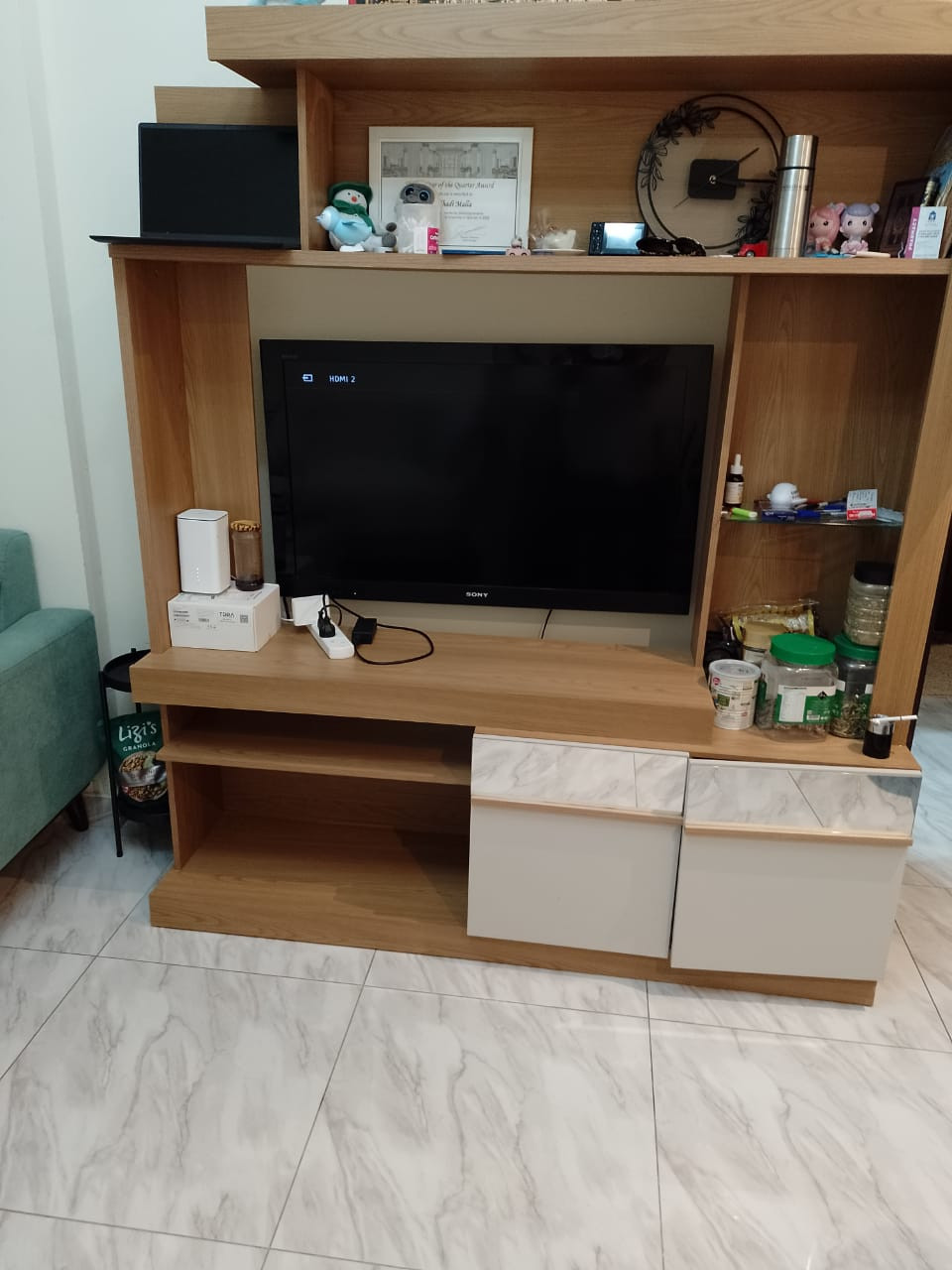 Furnished one bedroom and living room with clean furnishings in Al Taawun