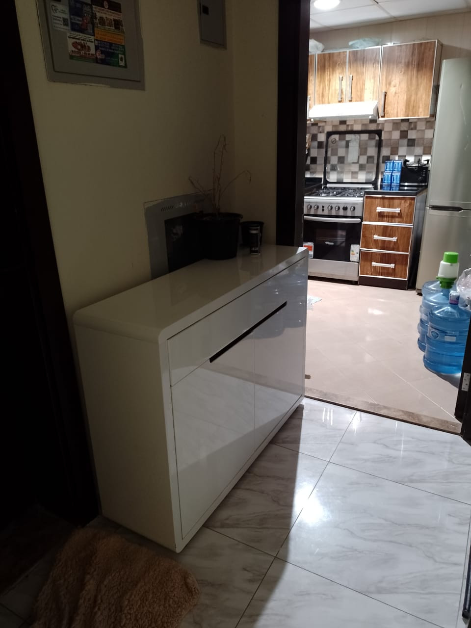 Furnished one bedroom and living room with clean furnishings in Al Taawun