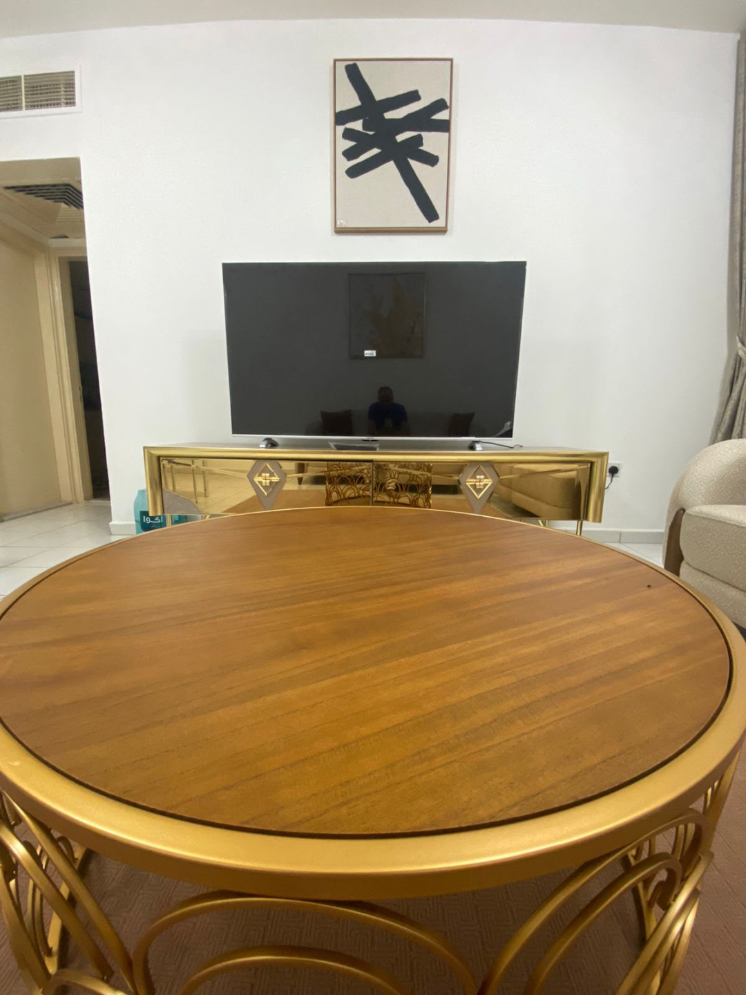 One bedroom and living room furnished with very clean furniture.