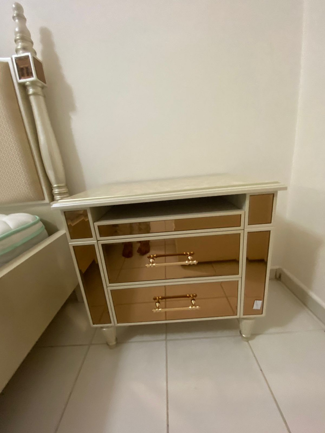 One bedroom and living room furnished with very clean furniture.