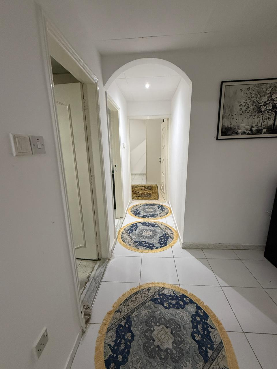 One bedroom and living room furnished with clean furniture and a balcony