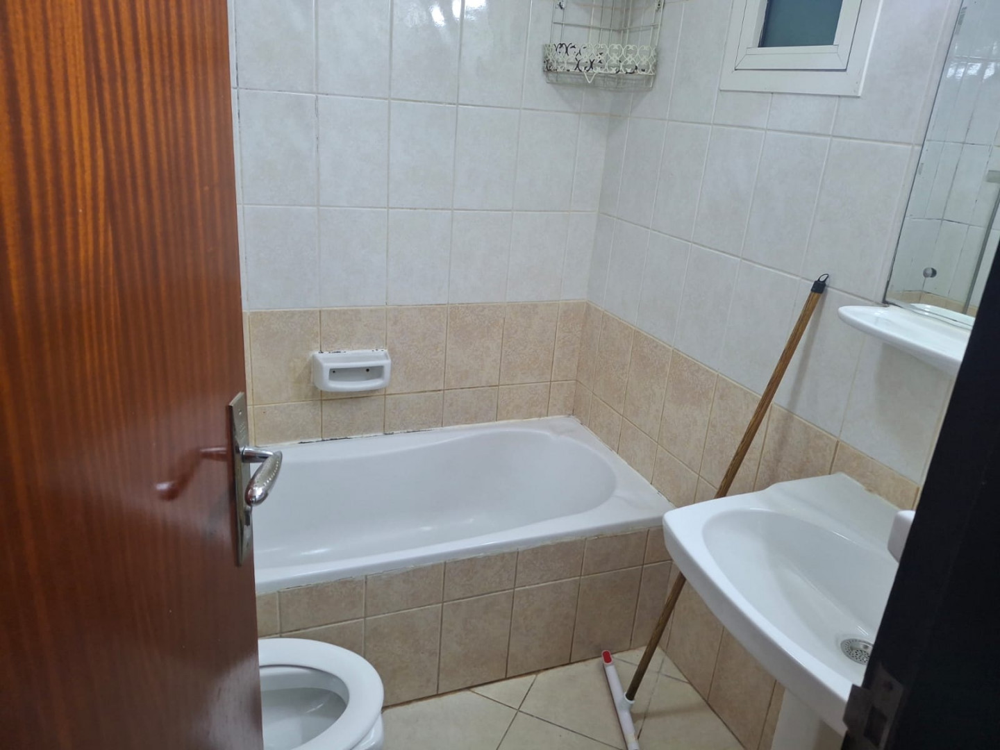 One bedroom and living room furnished with clean furniture and two bathrooms