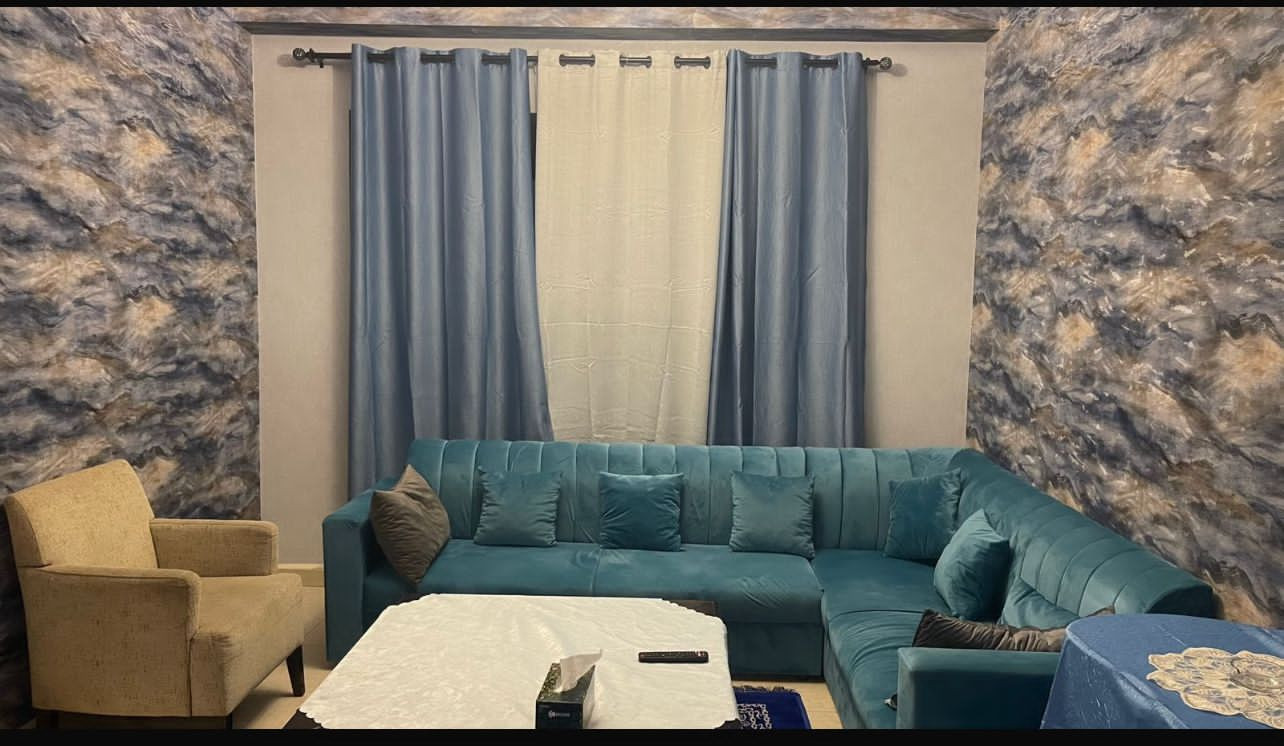 One bedroom and living room furnished with clean furniture and two bathrooms
