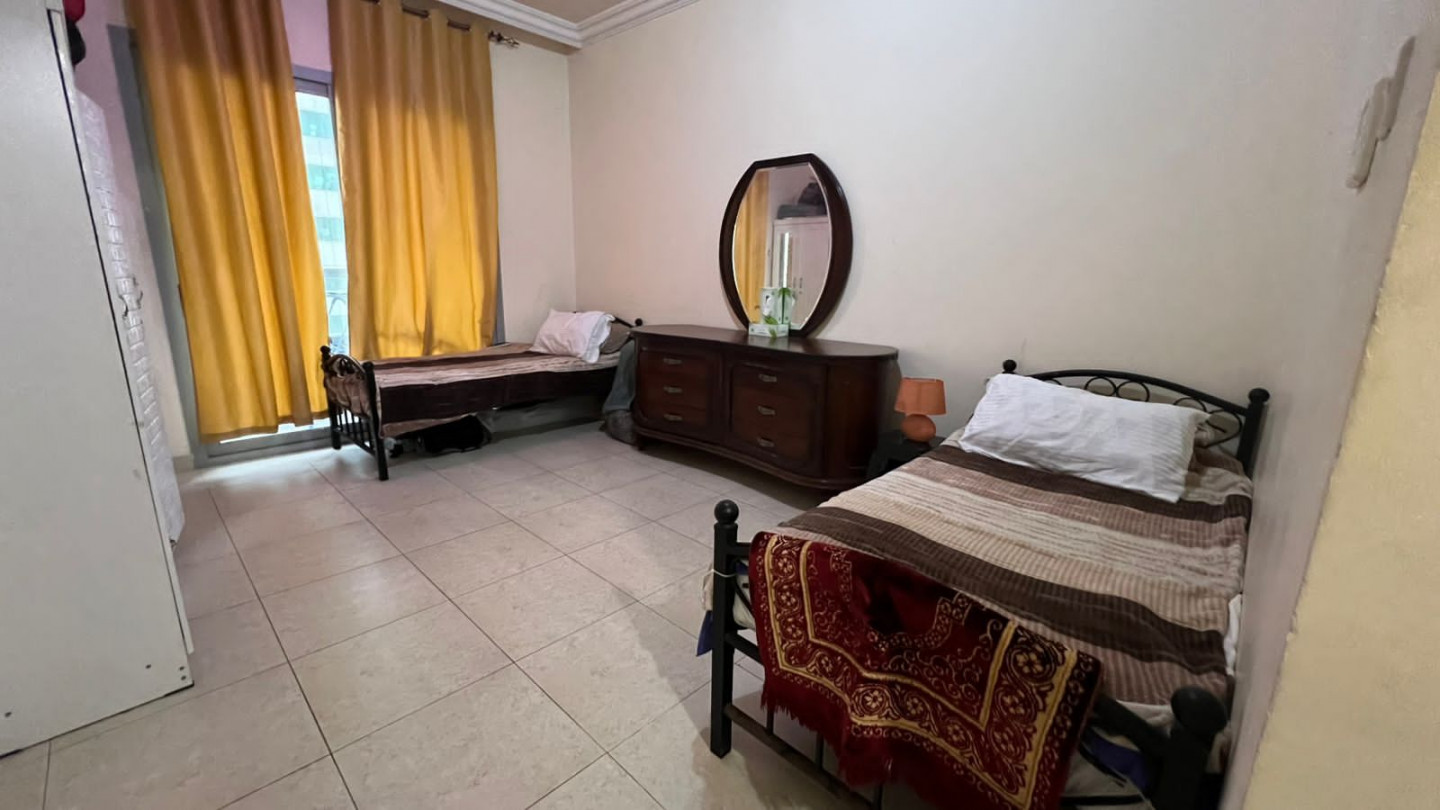 One bedroom and living room furnished with clean furniture and two bathrooms